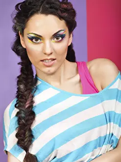 Beautiful Model Drucke: Closeup portrait of a beautiful model with creative dynamic multicolor make up