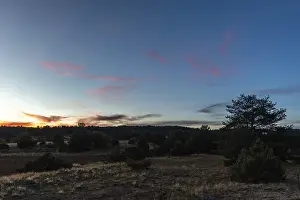 Evening Light In Europe Drucke: Cloud and clear sky during a sunset