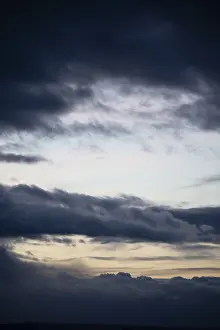 Deserted Evening Sky Drucke: Cloud hole at sunset, bizarre clouds