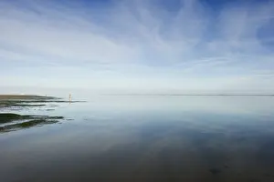Overcast Sky Waterfront Scene Drucke: Cloud reflection in the mudflats