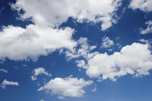 Clear Blue Skies Photo Drucke: Clouds in a blue sky