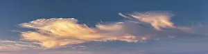 Cloudy Atmospheric Light Drucke: Clouds in the evening light, panorama
