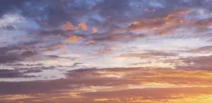 Evening Sun Photography Drucke: Clouds in the evening light at sunset