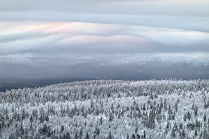 Overcast Sky In Europe Drucke: Clouds over forested mountain ranges