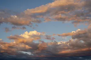 Evening Sun Clouds Drucke: Clouds illuminated by the evening sun