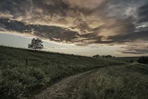 Atmospheric Evening Light Drucke: Clouds mood in autumn at sunset