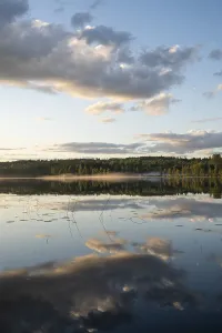Scandinavian Landscape Photo Drucke: Clouds reflected on the water surface