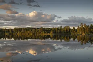 Clouds Reflected On Water Drucke: Clouds reflected on the water surface
