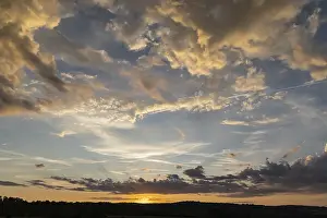 Cloudy Atmospheric Photography Drucke: Clouds in the sky, dramatic cloud atmosphere shortly in front of sunrise