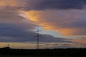 Central Europe Sunset Mood Drucke: Clouds, sunset, high-voltage pole