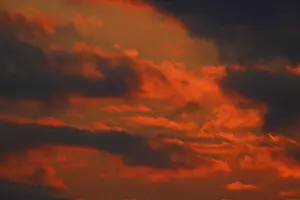 Central European Water Scenes Drucke: Clouds at sunset on the Trebel River