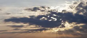 Cloudy Atmosphere Drucke: Cloudy atmosphere just before sunset