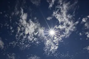 Light Beam Photography Drucke: Cloudy sky with altocumulus clouds and sun rays
