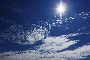 Upper Austria Weather Drucke: Cloudy sky with altocumulus clouds and sun rays
