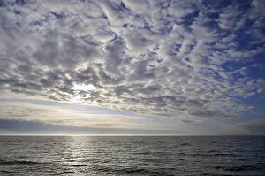 Baltic Sea Evening Atmosphere Drucke: Cloudy sky, cloud formations in front of the setting sun