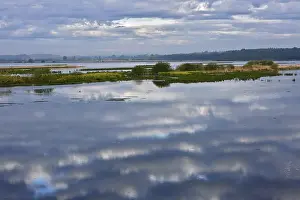 Nature Park Peenetal Drucke: Cloudy sky landscape reflected in a vast