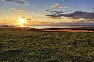 Deserted Meadow Landscape Drucke: Coast with meadows and fields, sunset