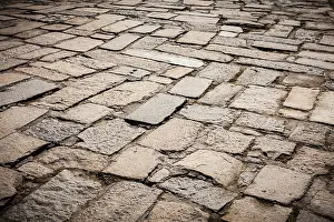 Paved Road Surface Drucke: Cobblestone pavement background