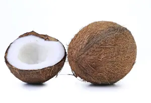 Bright Studio Shot Drucke: Coconut and slice on a white background