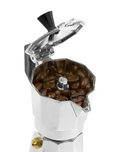 Drucke von Kaffeebohnen und Mokkamaschine auf weißem Hintergrund Arabica Drucke: Kaffeebohnen und Mokkamaschine auf weißem Hintergrund.