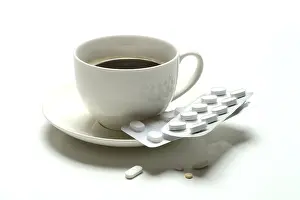 Coffee And Medication Drucke: Coffee in a cup and medication