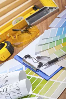 Creative Studio Shot Drucke: Color palette and blueprints on table with other tools