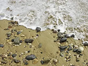 Sandy Beach Drucke: Colored pebbles on the beach