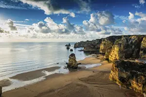 Steep Coastal Region Drucke: Coloured cliffs and sunrise at the beach