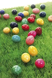 Colourful Easter Traditions Drucke: Coloured Easter eggs on a green meadow