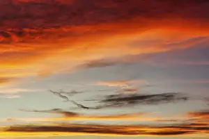 Blurred Motion Effect Drucke: Colourful cloudy sky at sunset