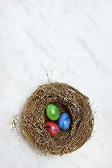 Easter Egg Symbolism Drucke: Colourful Easter eggs in Easter nest