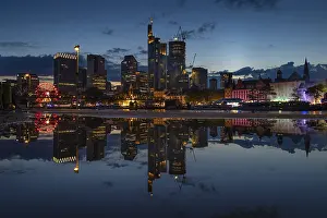Frankfurt Mainfest Drucke: The colourful lights of the Mainfest are reflected in a puddle