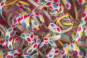 Deserted Party Scene Drucke: Colourful streamers with balloon patterns in different colors