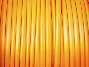 Empty Grocery Aisle Drucke: Communication cable in orange on a roll