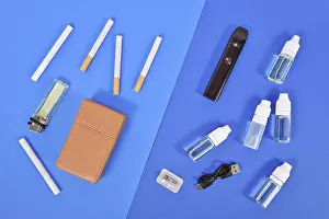 Transporting Goods By Sea Drucke: Comparison between electronic and real cigarette with tools