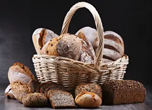 Wicker Basket Composition Drucke: Composition with assorted bakery products in wicker basket