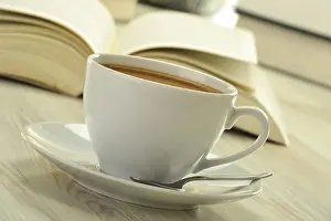 Educational Institution Scene Drucke: Composition with books and cup of coffee on the table