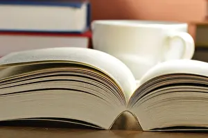 Book Arrangement On A Table Drucke: Composition with books on the table