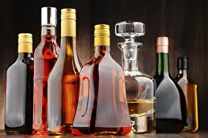 Distilled Spirits Showcase Drucke: Composition with bottles of assorted alcoholic beverages