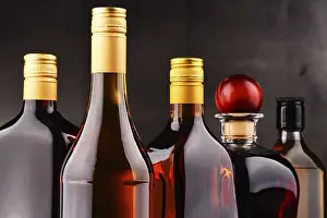 Distilled Spirits Showcase Drucke: Composition with bottles of assorted alcoholic beverages