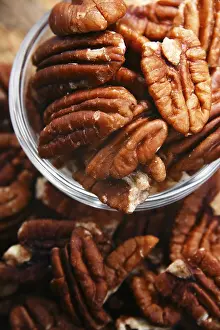 Vegetarian Appetizers Drucke: Composition with a bowl of shelled pecan nuts
