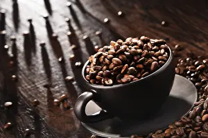 Caffeine Nutrition Facts Drucke: Composition with cup of coffee and beans