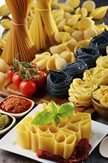 Mediterranean Food Photography Drucke: Composition with different sorts of pasta on kitchen table