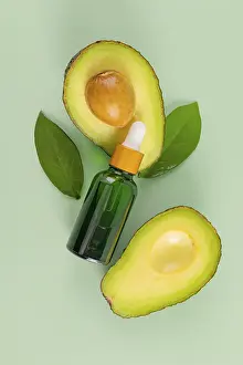 Eco Friendly Cosmetics Drucke: A composition featuring a green bottle with a dropper