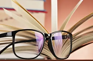 Composition With Glasses And Books Drucke: Composition with glasses and books on the table