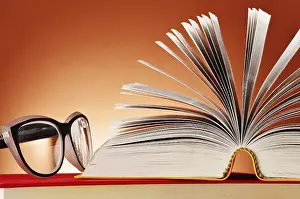 Composition With Glasses And Books Drucke: Composition with glasses and books on the table