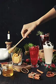 Cozy Christmas Celebration Drucke: Composition with herbal and fruit tea with ingredients on the table