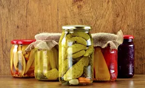 Deserted Table Setting Food Drucke: Composition with jars of pickled vegetables