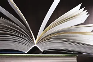 Deserted Library Scene Drucke: Composition with open book on the table