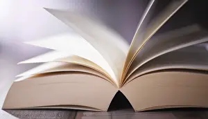 Deserted Library Scene Drucke: Composition with open book on the table